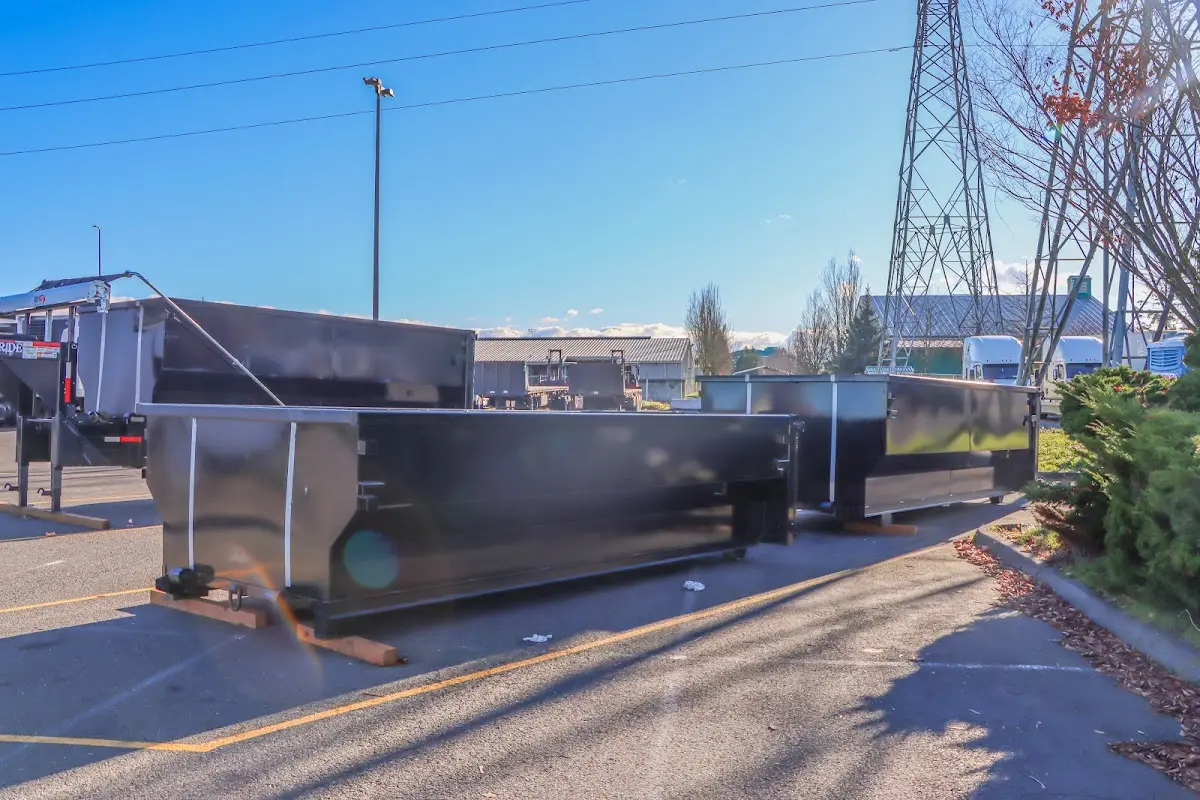 Roll-off dumpster ready for waste disposal at job site for 12 Yard Dumpster Rental in Plano